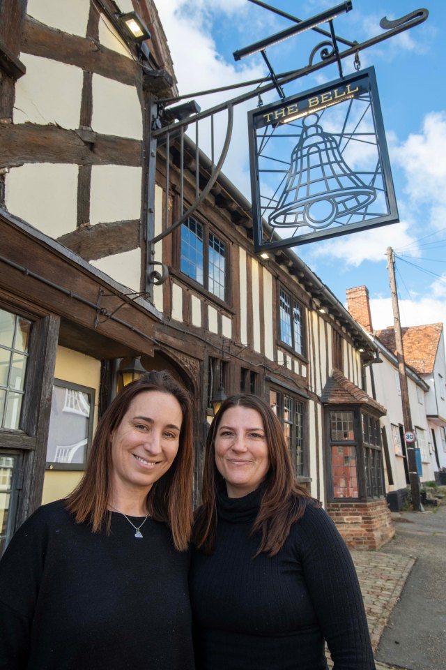 Bar workers Becky Waldron and Rachael Farthing at The Bell Inn in Kersey