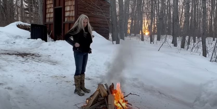 Lisette gathers and chops all of her wood by herself