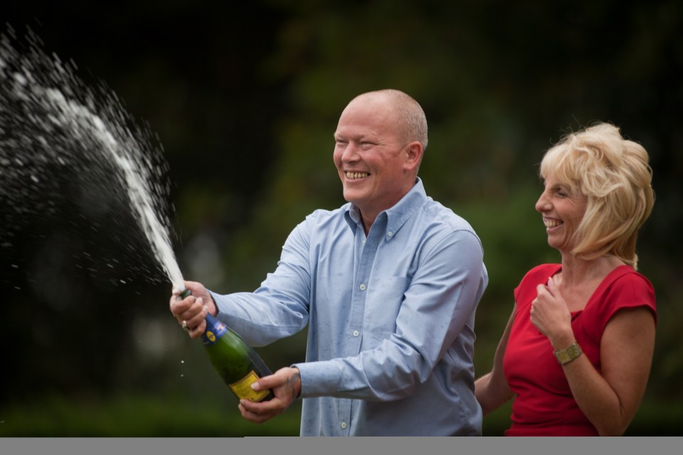 Dave and Angela celebrate their whopping win