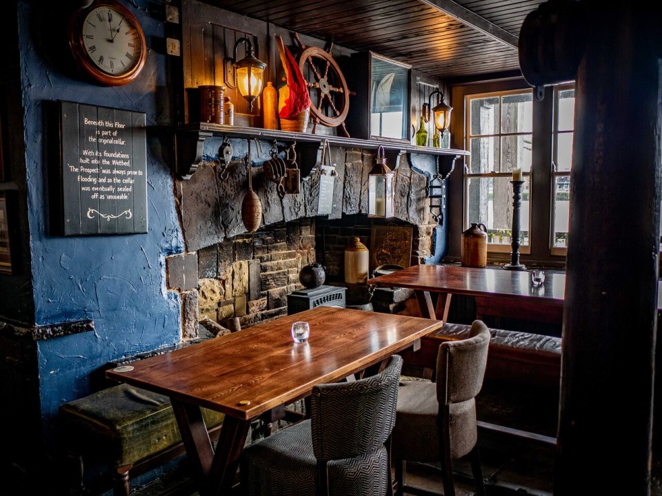 The pub has cosy wooden decor inside and remains popular with regulars