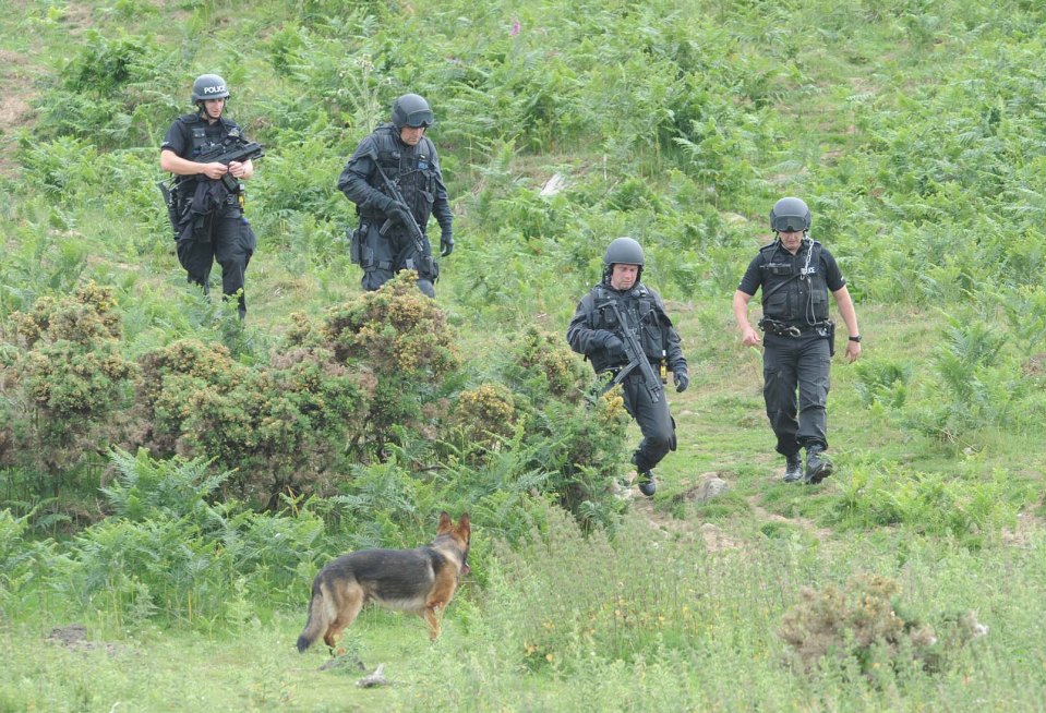 Heavily armed police led the search for Moat