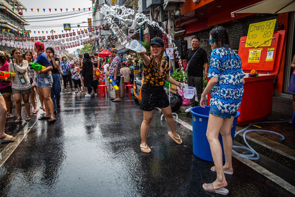 Stores often leave buckets of water outside so people can refill their pistols