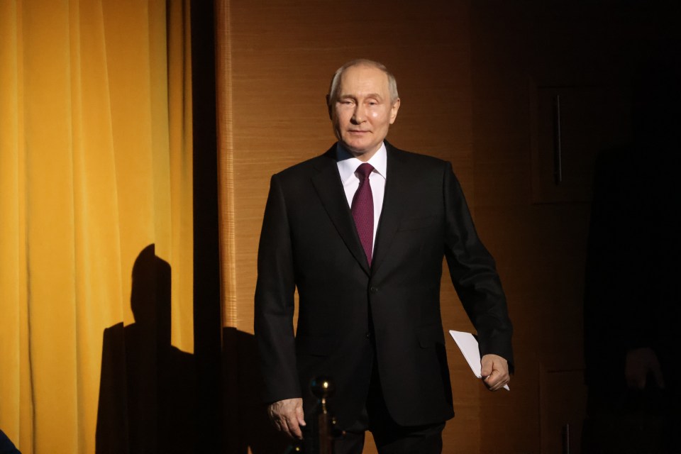 Putin is pictured today at an event to mark Cosmonaut Day at the Kremlin