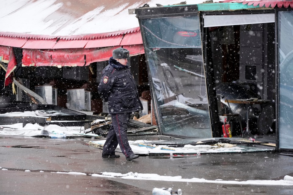 The aftermath of the bomb that tore through a St Petersburg café which killed Tatarsky and injured over 30 others on Sunday