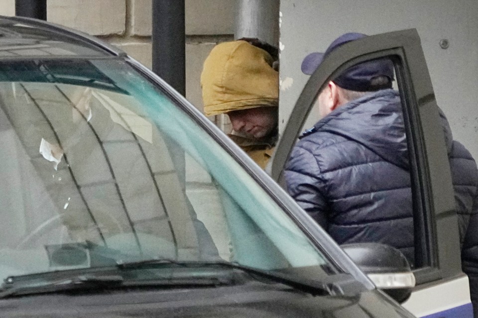 He was seen being led into a car outside a court in Moscow