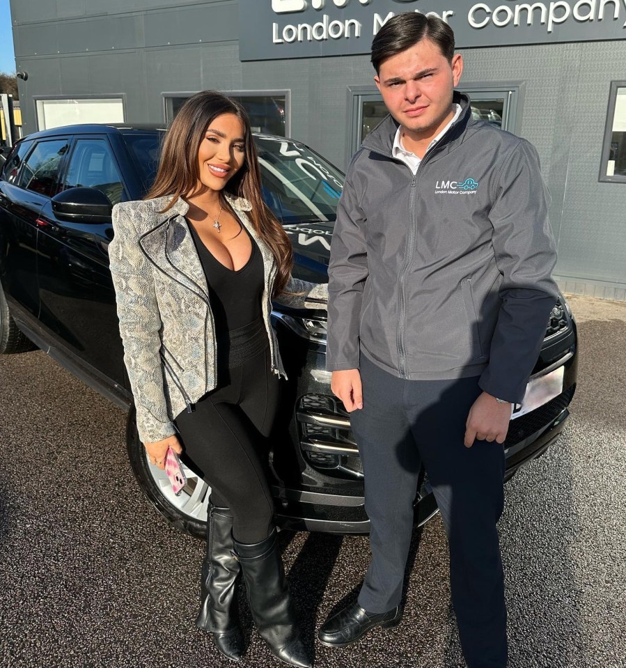 Chloe picking up her Land Rover Evoque from the car dealer