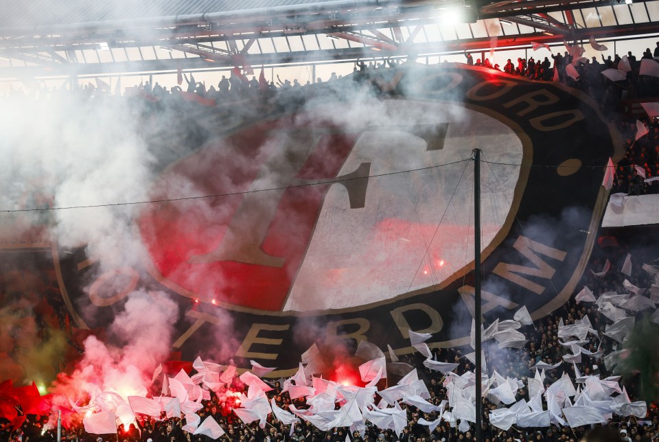 Fans let off flairs before Feyenoord's clash with Ajax