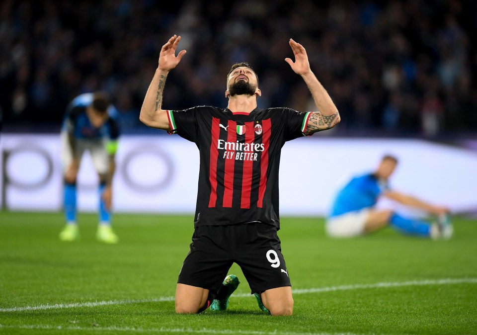 Olivier Giroud celebrates the goal that put AC Milan in the Champions League last four  after a 2-1 aggregate triumph over Serie A leaders Napoli