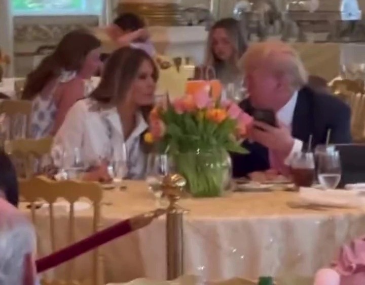 Donald and Melania Trump enjoy an Easter brunch blocked off by ropes at their Mar-a-Lago resort