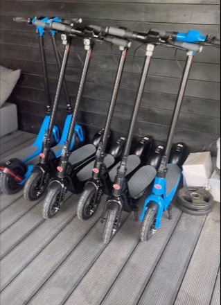 Tate shows off his collection of e-scooters to his Twitter followers