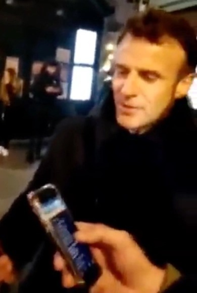 Emmanuel Macron was filmed singing Le Refuge with a group of men on the street