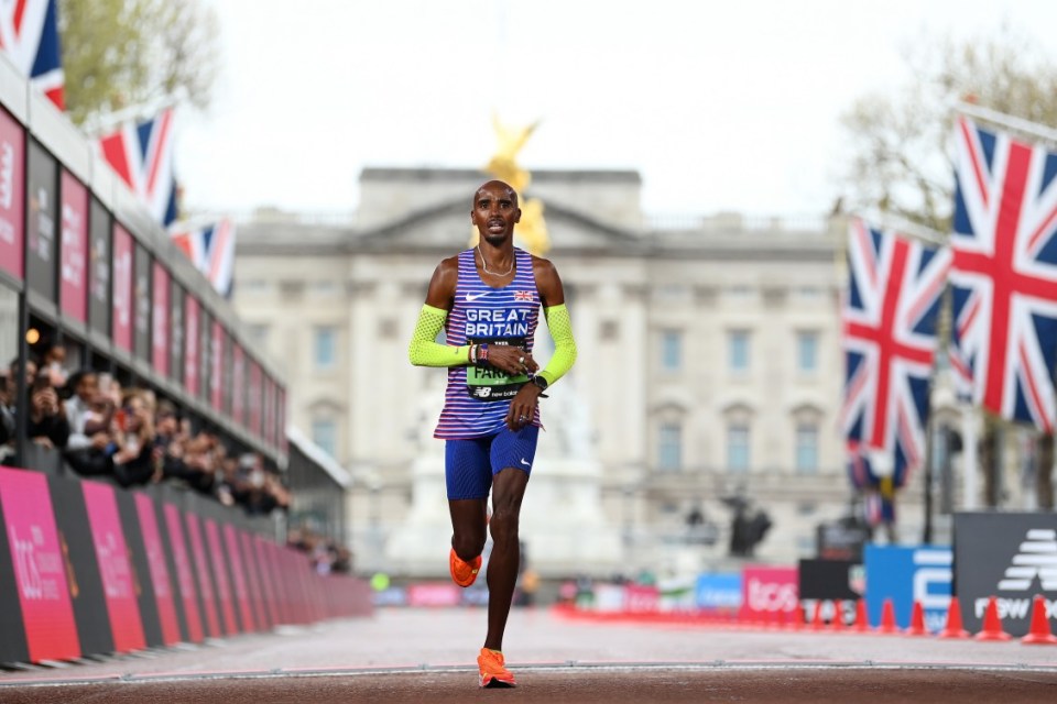 Mo Farah crosses the finish line in the Elite Men's race at the 2023 London Marathon