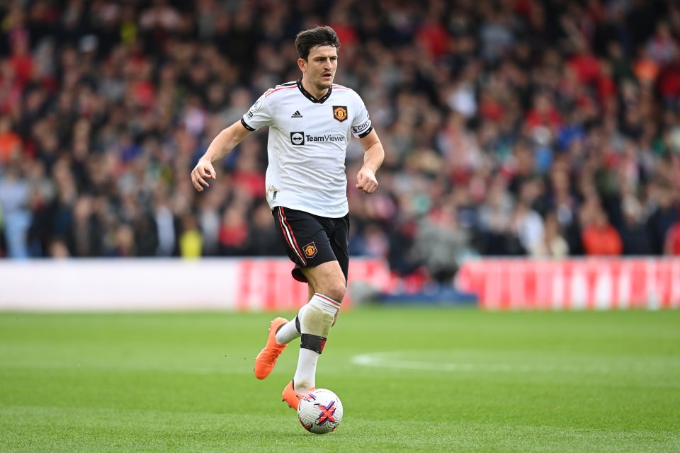 NOTTINGHAM, ENGLAND - APRIL 16: Harry Maguire of Manchester United runs with the ball during the Premier League match between Nottingham Forest and Manchester United at City Ground on April 16, 2023 in Nottingham, England. (Photo by Michael Regan/Getty Images)