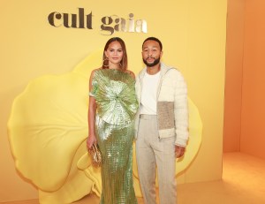  Chrissy Teigen and John Legend attend the Cult Gaia RE24 Runway Show on November 14, 2023, in Los Angeles, California