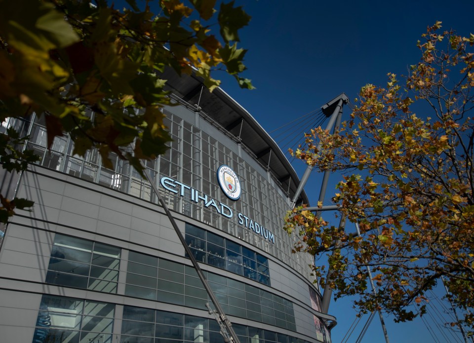 MANCHESTER, ENGLAND - OCTOBER 30: A general view of the Etihad Stadium logo with the Manchester City club crest between autumn leaves before the Premier League match between Manchester City and Crystal Palace at Etihad Stadium on October 30, 2021 in Manchester, England. (Photo by Joe Prior/Visionhaus)