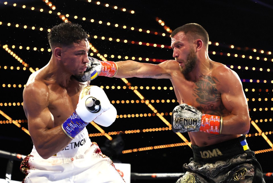 NEW YORK, NEW YORK - OCTOBER 29:  Vasiliy Lomachenko punches Jamaine Ortiz during their lightweight bout at The Hulu Theater at Madison Square Garden on October 29, 2022 in New York City.  (Photo by Al Bello/Getty Images)