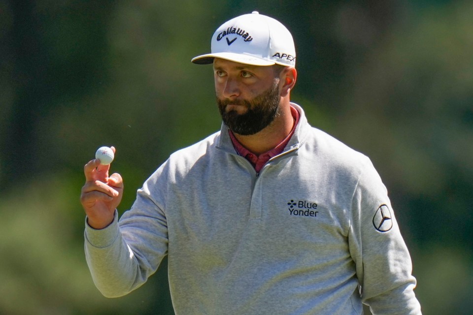 Jon Rahm, of Spain, waves after his putt on the third hole during the final round of the Masters golf tournament at Augusta National Golf Club on Sunday, April 9, 2023, in Augusta, Ga. (AP Photo/Jae C. Hong)