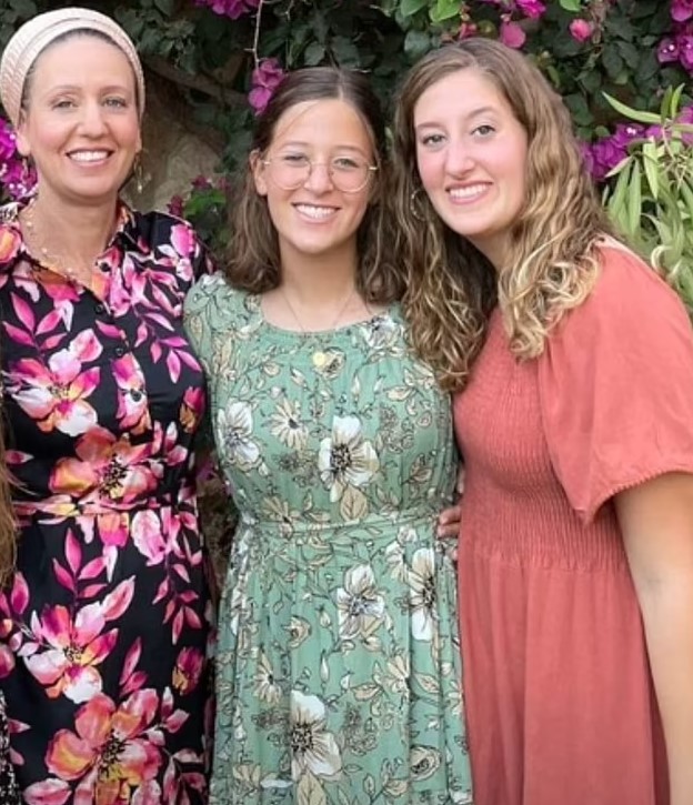 The 48-year-old pictured with daughters Rina and Maia