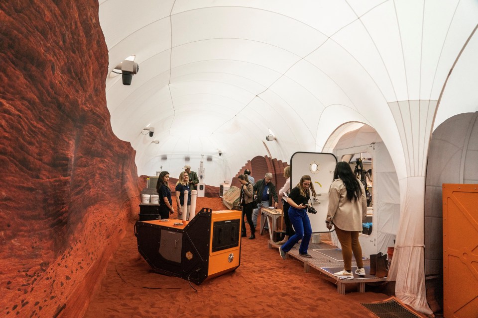 Members of the media tour inside the Mars landscape simulation area at the agency's Johnson Space Centre in Houston, Texas, US