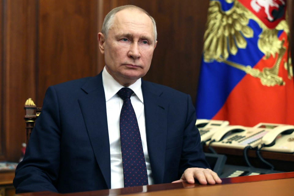 Russian President Vladimir Putin addresses servicemen of Rosguardia (National Guard) troops to congratulate them on their professional holiday in Moscow, Russia, Monday, March 27, 2023. (Gavriil Grigorov, Sputnik, Kremlin Pool Photo via AP)