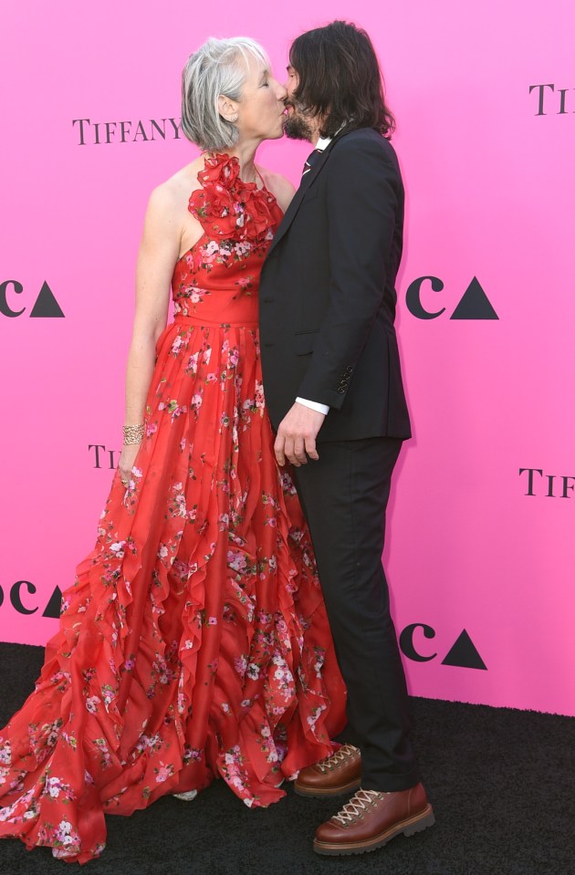 The pair kissed in front of photographers at the Museum of Contemporary Art