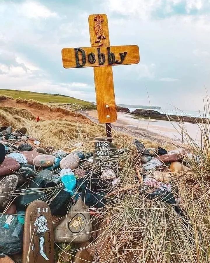 Tourists can still visit Dobby's Grave on the beach