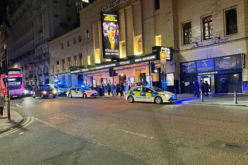 Police outside the theatre in Manchester last night