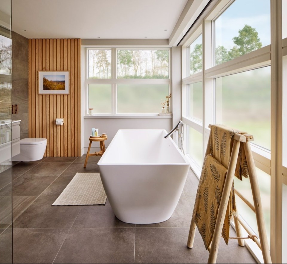 The master bedroom boasts a luxurious en-suite bathroom with double ended bath and walk in shower