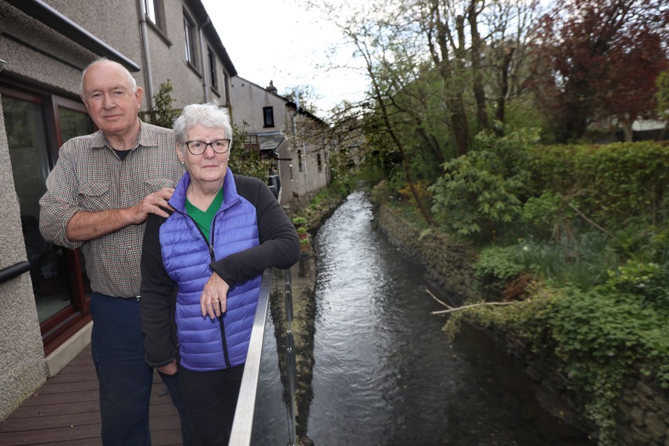 Marian and Wilf Hadwin, whose balcony overlooks the river, say the smell is 'revolting'