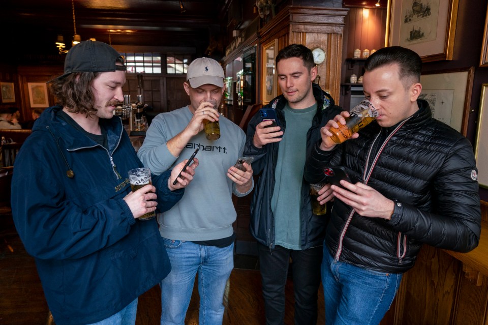 Punters all read the message as they sip a pint