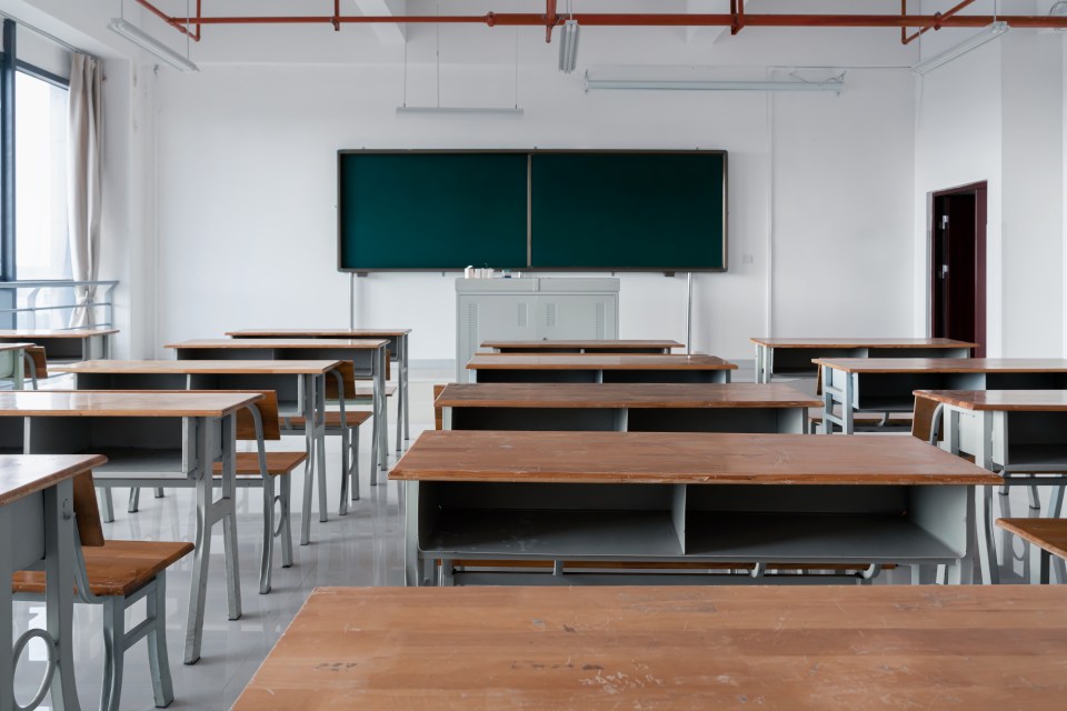 Classrooms with desks, chairs, podiums and blackboards