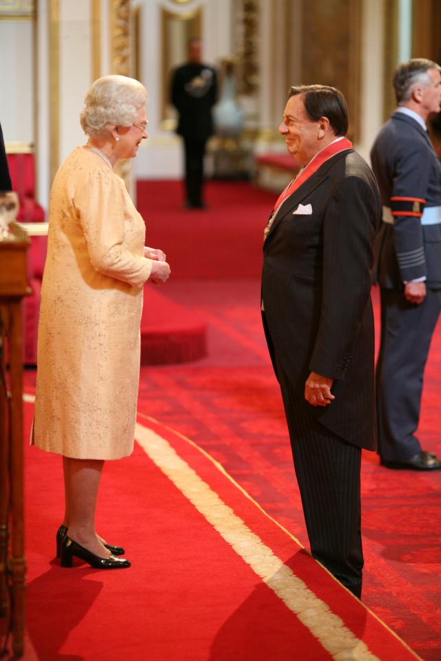 Barry Humphries was made a Commander of the British Empire by The Queen at Buckingham Palace