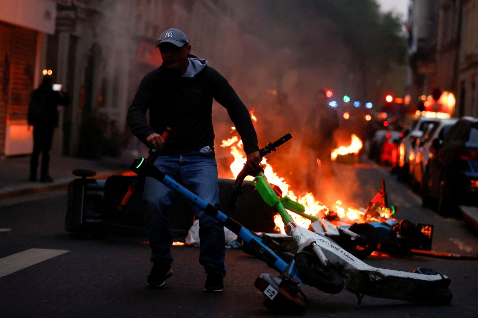 Fires burned as protesters took to the streets of Paris