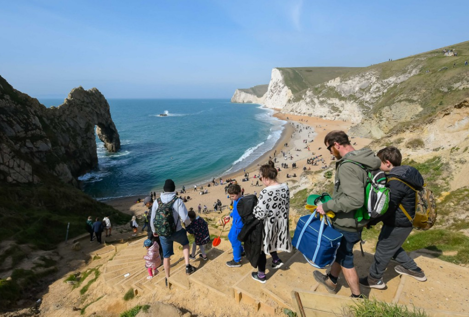 Holidaymakers at Durdle Door in Dorset on Easter Sunday