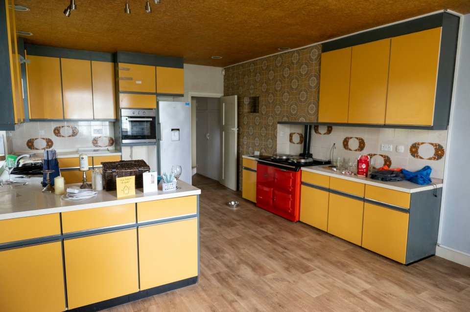 The Formica kitchen is extremely dated at the property