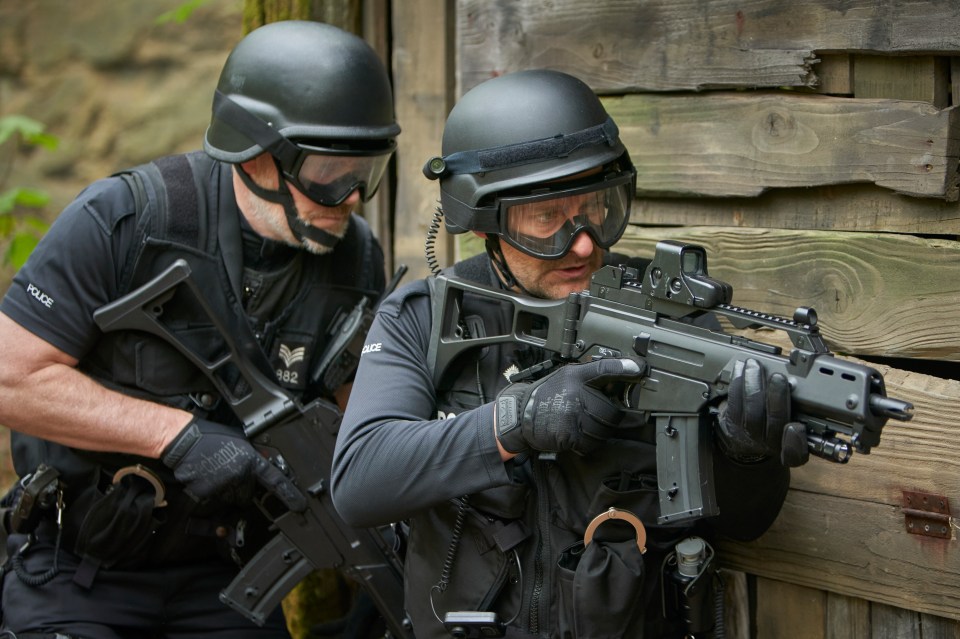 Armed police stalked through countryside while locals were warned to stay indoors until Moat was cornered by officers near a riverbank on July 9