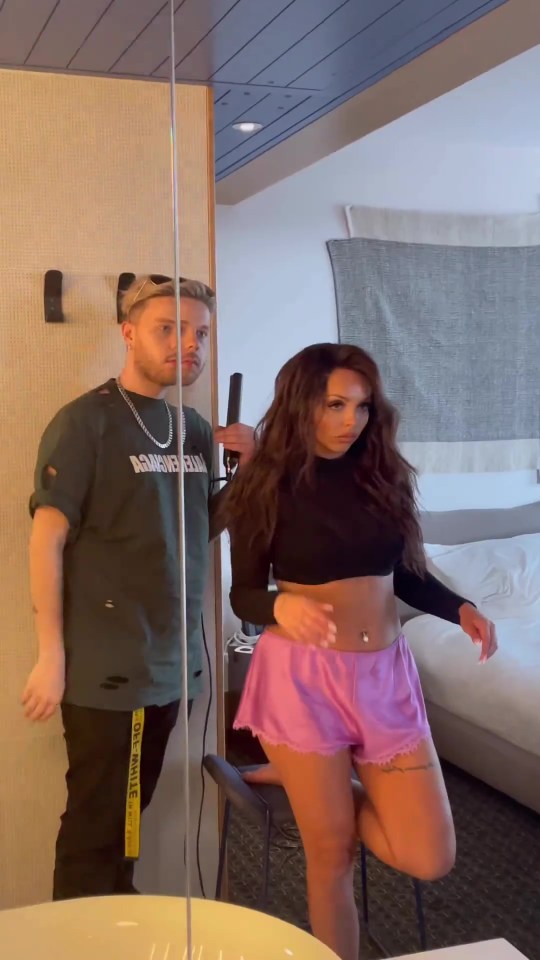 The former Little Mix star wowed fans in a crop top and a pair of silk pink shorts showing off her abs