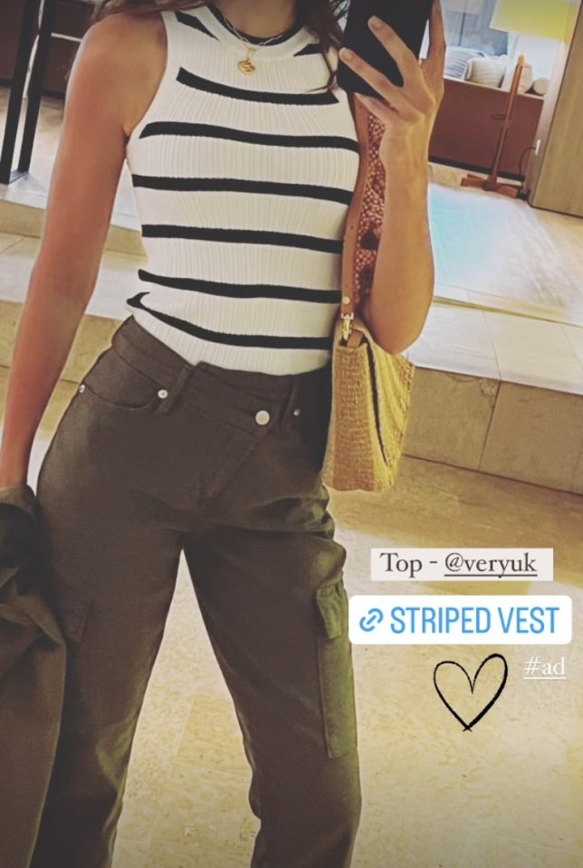 Michelle Keegan showed off her slim figure in a striped vest top