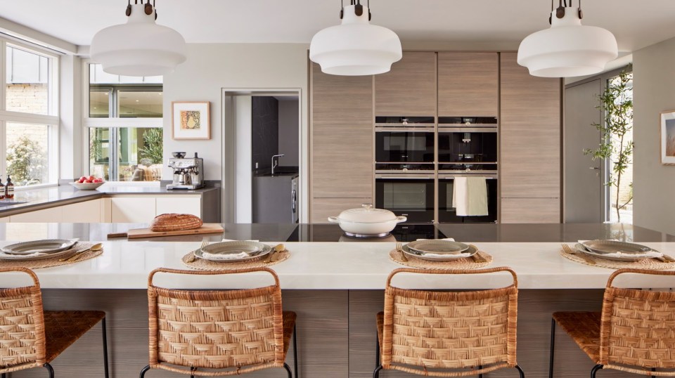 The spacious kitchen also boasts a lengthy breakfast bar