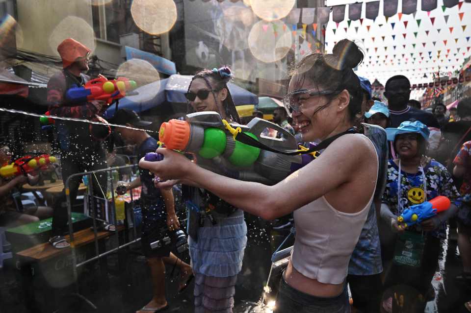 Water pistols, hose pipes and smiles were in abundance on the streets of Bangkok