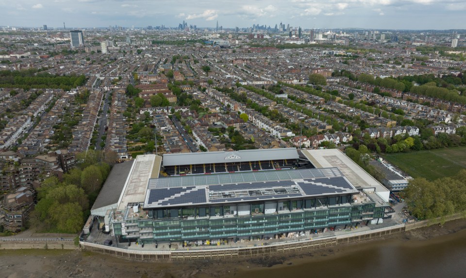 Fulham's old sponsor FxPro are still visible on two of Craven Cottage's stands