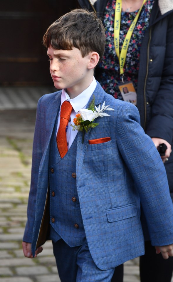 Chesney's son Joseph wore a matching suit to his dad's