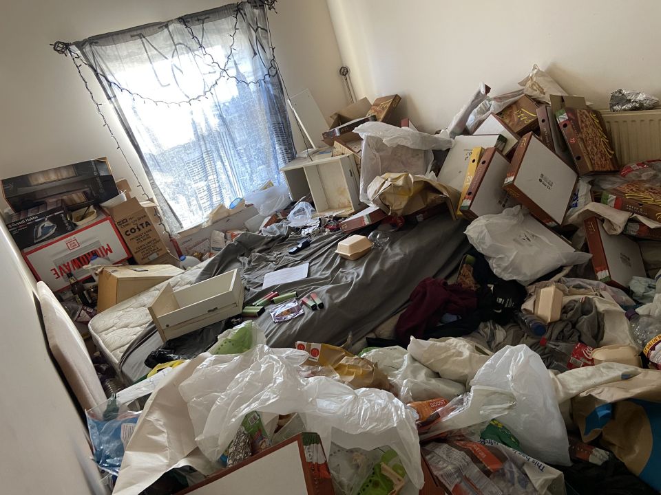 Bottles of urine were also found amongst the heap in the Greater Manchester flat