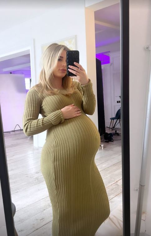 Dani Dyer showed off her growing baby bump in a tight dress