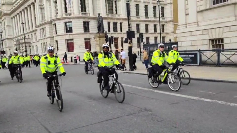 The PM's motorcade was flanked by cops on bicycles