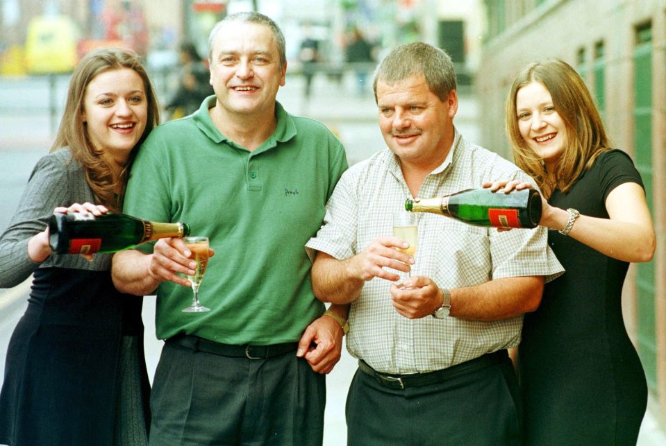 Roy with his daughters Lucy and Laura and fellow lotto winner Robert Gale