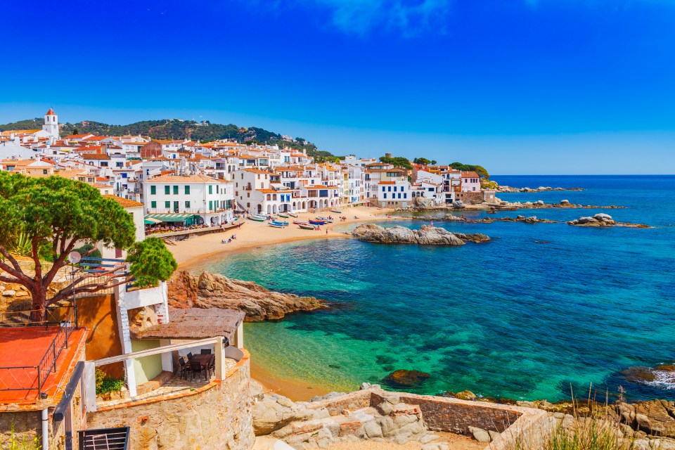 Calella's town centre stretches for two miles and is surrounded by golden sand beaches along the Mediterranean Sea