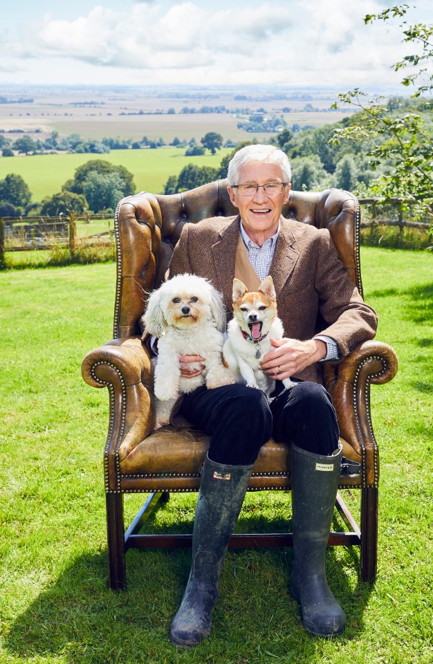 Paul paused to take a snap with his pooches just days before his death