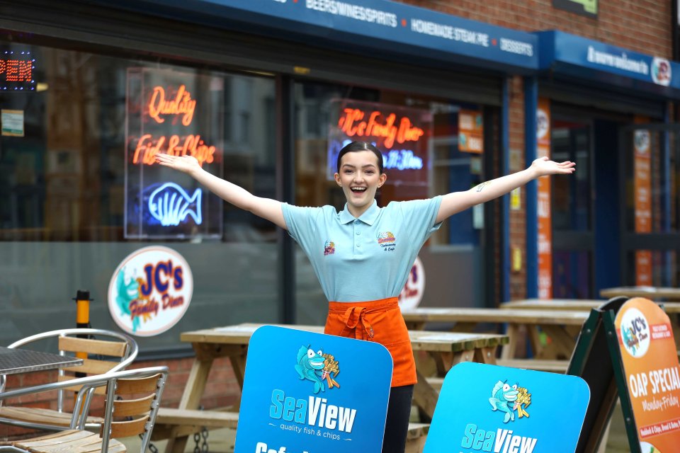 Chip shop worker Olivia McCoid outside JC's Family Diner in Bridlington, East Yorkshire