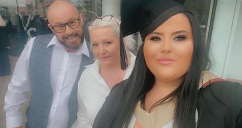 Bethannie with her parents on her graduation